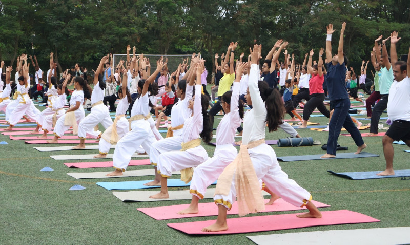 Strengthening Bonds Through Yoga: Parent-child duos Celebrate International Yoga Day at Greenwood High decoding=