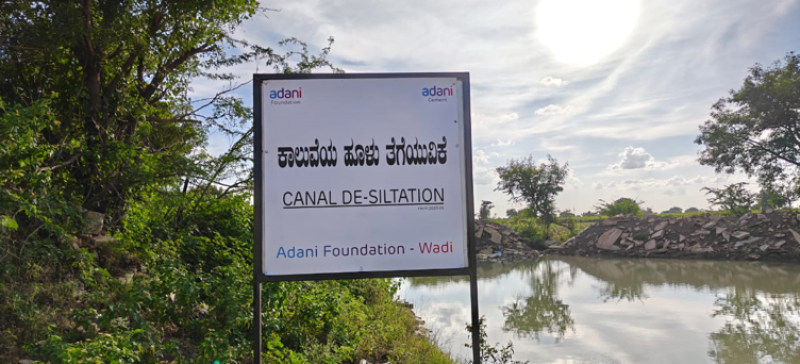 Adani Foundation at ACC Wadi restores water security for farmers in Kundanoor village through canal de-siltation decoding=