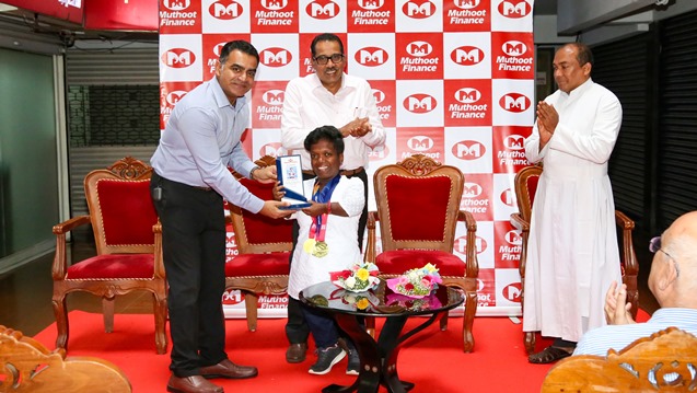 muthoot-finance-gifts-gold-winning-athlete-sinimol-k-sebastian-a-new-home-celebrates-her-historic-victory-at-the-world-dwarf-games-2023