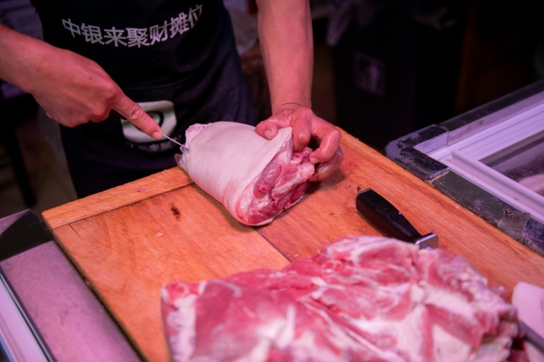China inflation surges as pork prices soar decoding=