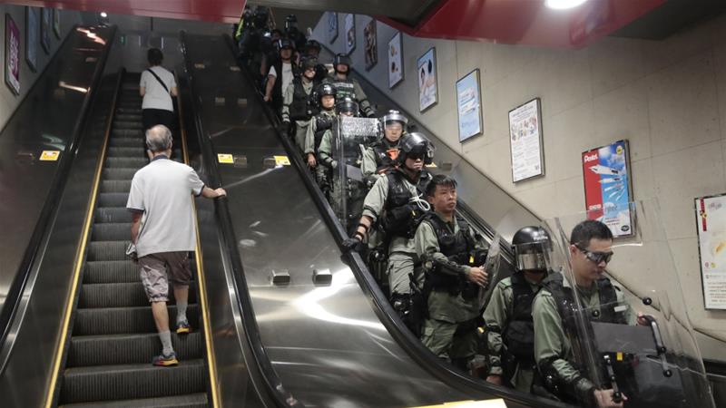 Hong Kong rail system faces delays as protesters target trains decoding=