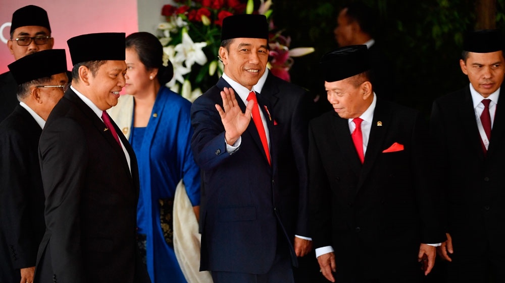 Indonesia’s President Joko Widodo sworn in for final term decoding=