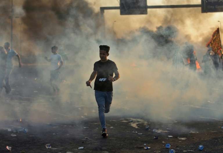 Iraqi PM pledges reforms to calm angry protests decoding=