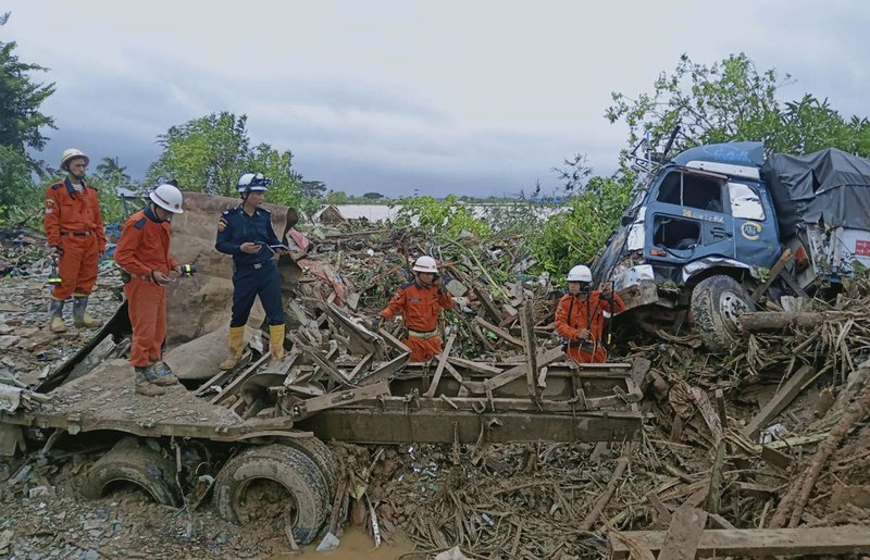 Death toll in Myanmar landslide climbs to 56 decoding=